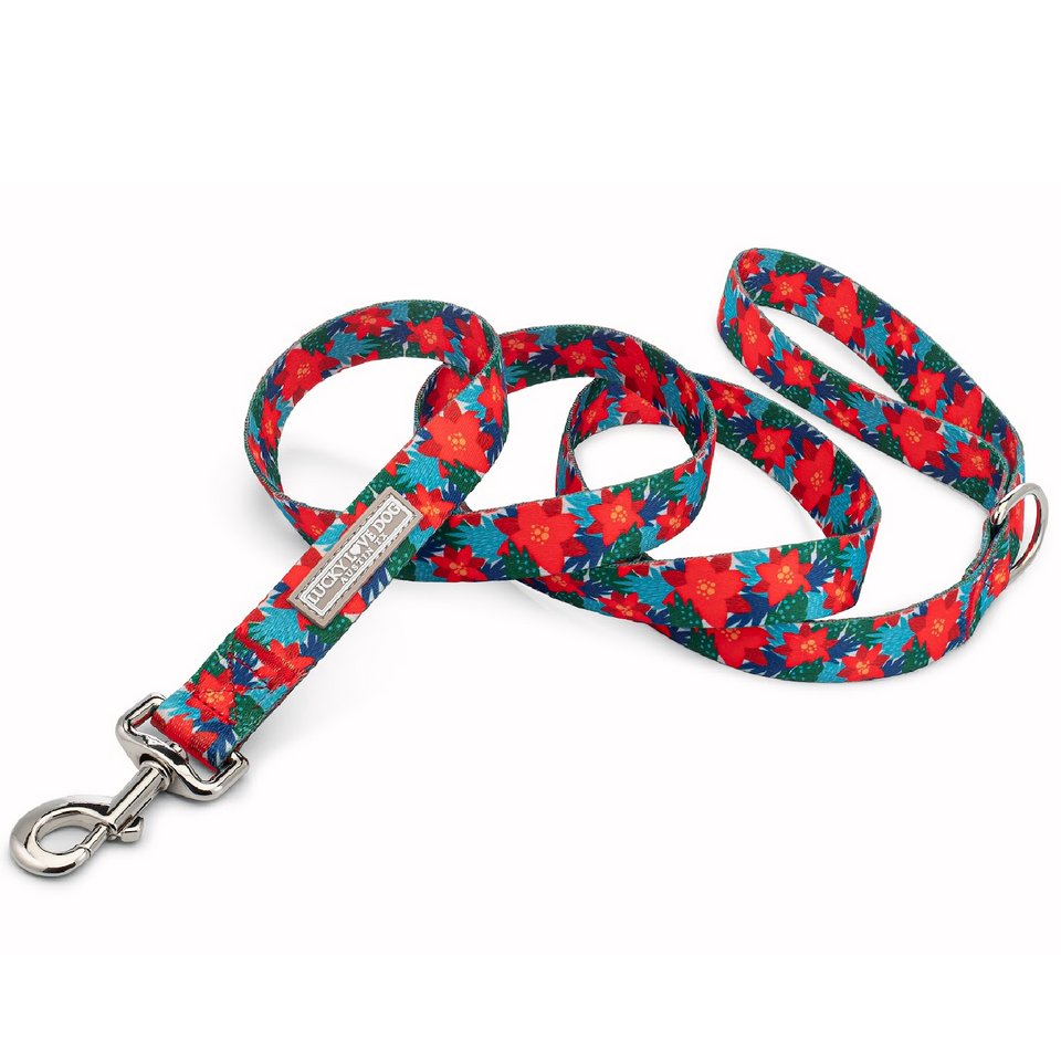 Red poinsettia-themed holiday dog leash by Lucky Love Dog Austin with metal clasp.