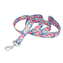 Light blue floral dog leash by Lucky Love Dog featuring a vibrant pink and yellow flower pattern with a silver metal clasp on a white background.