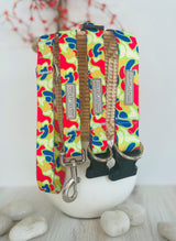 Bright multicolor dog leash and collars with abstract camo-style pattern