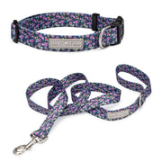 purple floral female dog collar and leash on white background