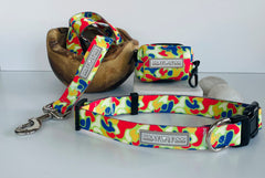 Colorful dog collar, leash, and waste-bag holder with a bright multicolor camo pattern